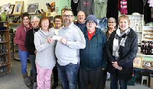 Thrift store donates $10,000 for CT Scanner